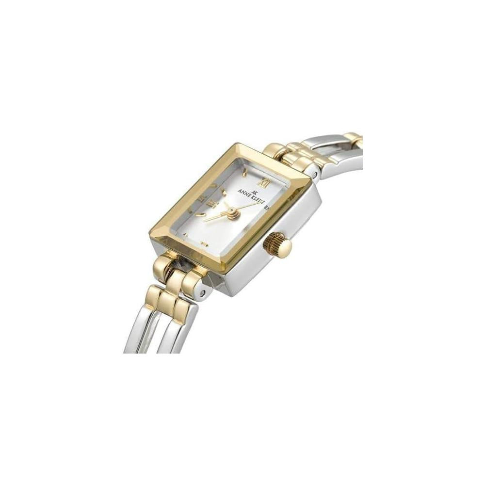 Reloj de pulsera para mujer Anne Klein con diseño bicolor, resistente al agua, esfera plateada y pulsera de metal
