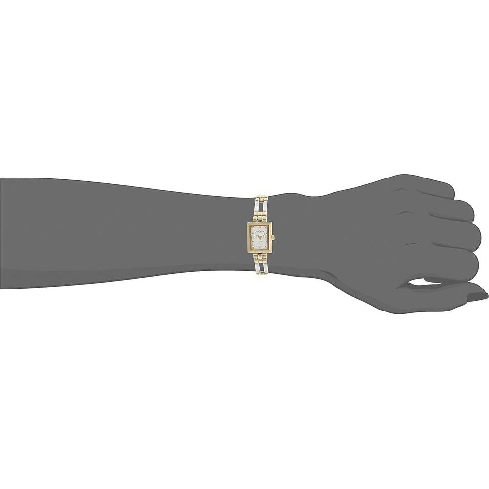 Reloj de pulsera para mujer Anne Klein con diseño bicolor, resistente al agua, esfera plateada y pulsera de metal