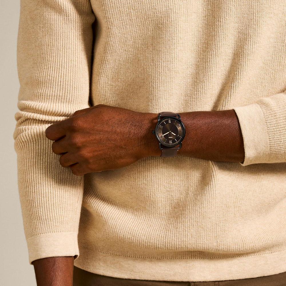 Reloj Fossil Copeland para hombre, acero inoxidable y cuero, movimiento de cuarzo con esfera negra e índices romanos, resistente al agua