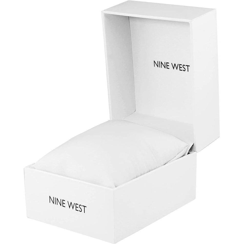 Reloj de pulsera para mujer Nine West en dorado con acero inoxidable, cristal resistente y diseño floral elegante