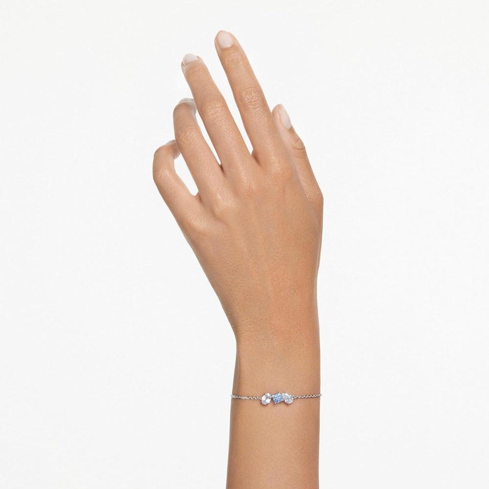 Pulsera Mesmera de Swarovski con piedras azules y claras en cadena de rodio