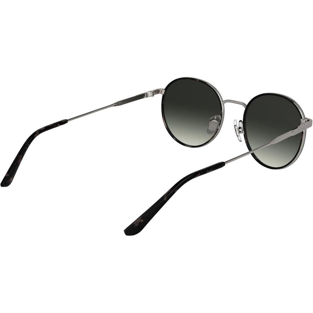 Lentes de sol Calvin Klein CK25101S con diseño redondo y marco de metal, incluyendo almohadillas nasales ajustables para mayor comodidad